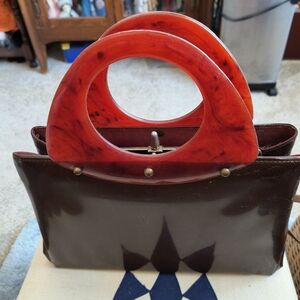 Elegant Brown and Red Handbag